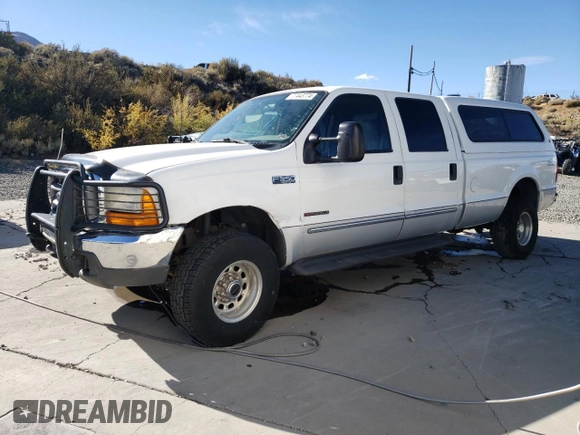 2000 Ford F-350 XL with VIN 1FTSW31F5YEA50810, listed as a Copart auction lot 83274144 with 147,370 mi miles and Salvage Title. Bid and sale history available at DreamBid. Image 1.