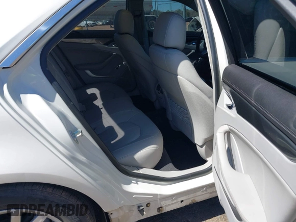 2012 Cadillac CTS z VIN 1G6DA5E51C0151324, wystawiony jako IAAI lot #41811207 z przebiegiem 100 407 mil mil oraz . Historia ofert i sprzedaży dostępna na DreamBid. Obrazek 8.