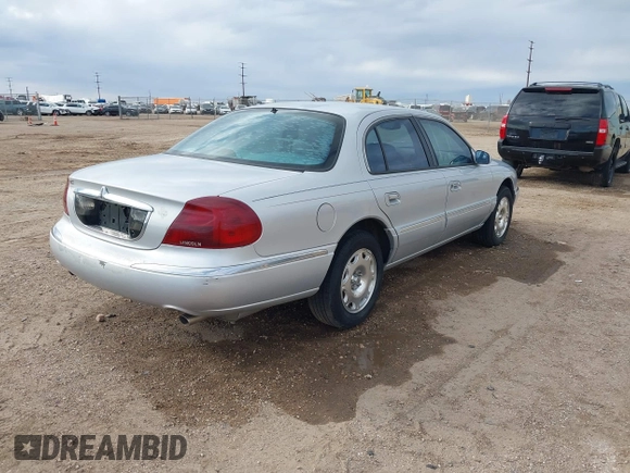 1998 Lincoln Continental with VIN 1LNFM97V8WY637860, listed as a IAAI auction lot 41746814 with 167,544 mi miles. Bid and sale history available at carsss.com. Image 4.