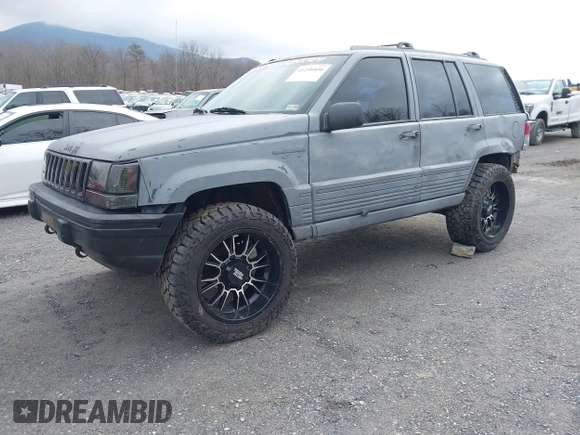 1995 Jeep Grand Cherokee Laredo with VIN 1J4GZ58S4SC778322, listed as a IAAI auction lot 41498800 with 255,058 mi miles. Bid and sale history available at carsss.com. Image 18.