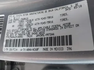 2018 Toyota Tacoma SR with VIN 3TMCZ5AN4JM148581, listed as a IAAI auction lot 41462945 with 115,655 mi miles. Bid and sale history available at carsss.com. Image 9.