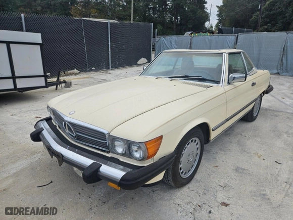 1987 Mercedes-Benz 560 Series 560SL with VIN WDBBA48D5HA061899, listed as a Copart auction lot 76554184 with NaN miles and Salvage Title. Bid and sale history available at carsss.com. Image 2.