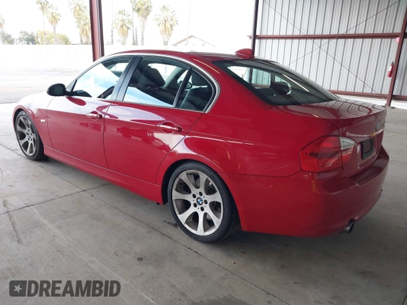 2007 BMW 3 Series 335i with VIN WBAVB73587P100572, listed as a IAAI auction lot 41409539 with 124,650 mi miles. Bid and sale history available at carsss.com. Image 3.