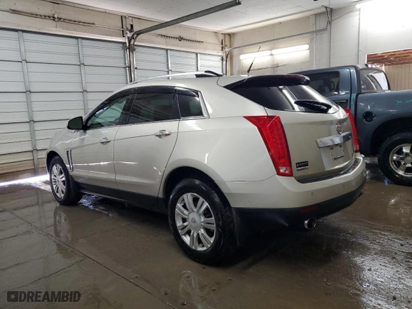 2013 Cadillac SRX Luxury Collection with VIN 3GYFNCE37DS623429, listed as a Copart auction lot 48884555 with 129,886 mi miles and Salvage Title. Bid and sale history available at carsss.com. Image 2.