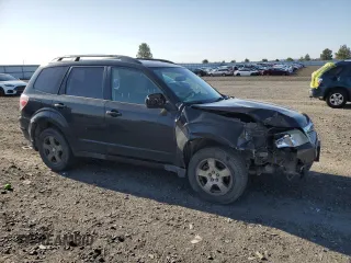 2011 Subaru Forester X z VIN JF2SHABC3BH740906, wystawiony jako Copart lot #54742575 z przebiegiem 181 927 mil mil oraz Szkoda całkowita • Salvage title. Historia ofert i sprzedaży dostępna na DreamBid. Obrazek 4.