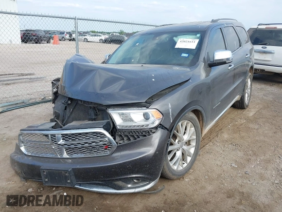 2014 Dodge Durango Citadel with VIN 1C4RDHEG2EC381324, listed as a IAAI auction lot 42021611 with 104,178 mi miles and . Bid and sale history available at DreamBid. Image 2.