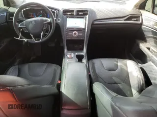 2019 Ford Fusion Titanium z VIN 3FA6P0RU5KR217242, wystawiony jako Copart lot #51985955 z przebiegiem 95 220 mil mil oraz Szkoda całkowita • Salvage title. Historia ofert i sprzedaży dostępna na DreamBid. Obrazek 8.