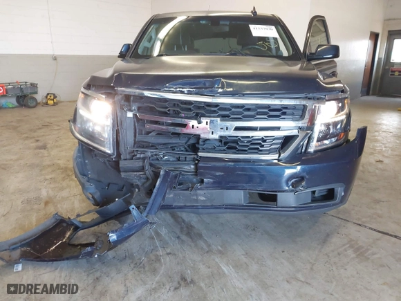2017 Chevrolet Tahoe Commercial with VIN 1GNLCDECXHR228908, listed as a IAAI auction lot 41537030 with 114,725 mi miles. Bid and sale history available at carsss.com. Image 6.