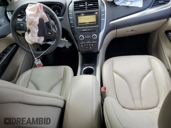 2019 Lincoln MKC Standard with VIN 5LMCJ1D95KUL45392, listed as a Copart auction lot 82561394 with 104,748 mi miles and Salvage Title. Bid and sale history available at DreamBid. Image 8.