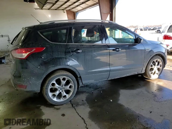 2014 Ford Escape Titanium with VIN 1FMCU0JX2EUD08165, listed as a Copart auction lot 89318205 with 134,721 mi miles and Salvage Title. Bid and sale history available at carsss.com. Image 14.