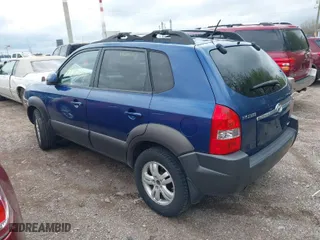 2006 Hyundai Tucson GLS with VIN KM8JN72D36U409525, listed as a IAAI auction lot 42082119 with 142,163 mi miles. Bid and sale history available at carsss.com. Image 3.