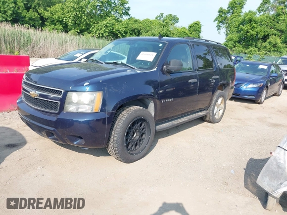 2007 Chevrolet Tahoe LT z VIN 1GNFC13J97J100573, wystawiony jako IAAI lot #42450311 z przebiegiem 234 099 mil mil oraz . Historia ofert i sprzedaży dostępna na DreamBid. Obrazek 2.