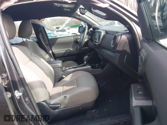 2021 Toyota Tacoma SR z VIN 3TMCZ5AN0MM392247, wystawiony jako IAAI lot #41645989 z przebiegiem 48 029 mil mil oraz . Historia ofert i sprzedaży dostępna na DreamBid. Obrazek 5.