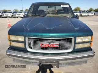 1995 GMC Sierra 1500 with VIN 2GTEC19H9S1560019, listed as a Copart auction lot 79917704 with 259,042 mi miles and Clean Title. Bid and sale history available at DreamBid. Image 5.
