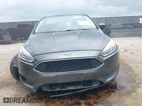 2018 Ford Focus SE z VIN 1FADP3F23JL321768, wystawiony jako IAAI lot #42415788 z przebiegiem 124 126 mil mil oraz . Historia ofert i sprzedaży dostępna na DreamBid. Obrazek 12.