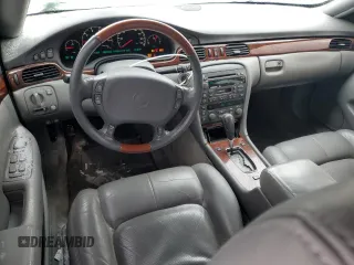 2002 Cadillac Seville Touring STS z VIN 1G6KY549X2U177791, wystawiony jako Copart lot #89313345 z przebiegiem 171 707 mil mil oraz Szkoda całkowita • Salvage title. Historia ofert i sprzedaży dostępna na DreamBid. Obrazek 8.