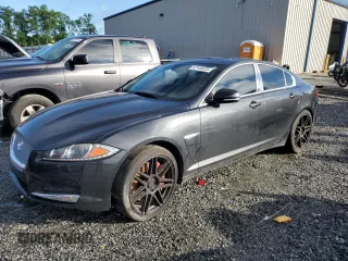 2014 Jaguar XF SC with VIN SAJWJ0EF0E8U31601, listed as a Copart auction lot 57146535 with 180,408 mi miles and Clean Title. Bid and sale history available at DreamBid. Image 1.