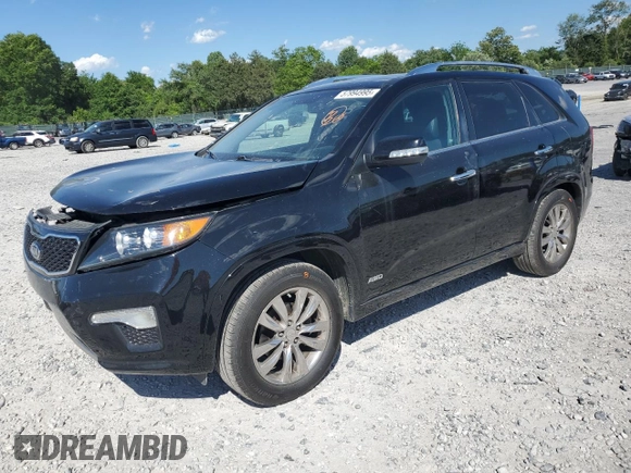 2012 Kia Sorento SX with VIN 5XYKWDA28CG300110, listed as a Copart auction lot 57994995 with 120,228 mi miles and Salvage title. Bid and sale history available at DreamBid. Image 1.