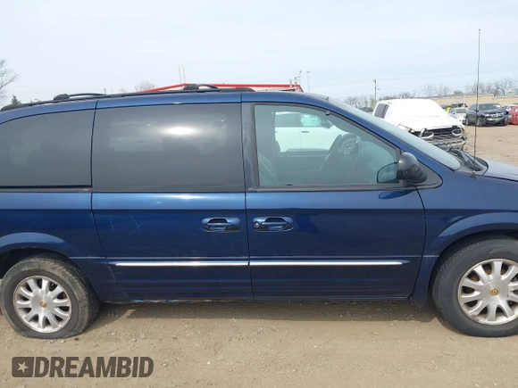 2001 Chrysler Town & Country LXi with VIN 2C4GP54L81R352276, listed as a IAAI auction lot 42059587 with 93,283 mi miles and . Bid and sale history available at DreamBid. Image 13.