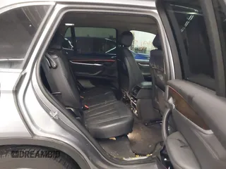 2016 BMW X5 xDrive35i z VIN 5UXKR0C5XG0U12540, wystawiony jako IAAI lot #41179965 z przebiegiem 75 997 mil mil oraz . Historia ofert i sprzedaży dostępna na DreamBid. Obrazek 8.