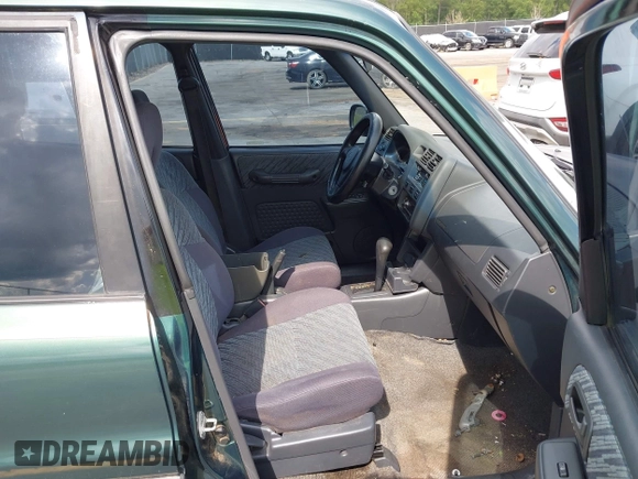 1999 Toyota RAV4 with VIN JT3GP10V4X7052720, listed as a IAAI auction lot 42490948 with 321,165 mi miles and . Bid and sale history available at DreamBid. Image 5.