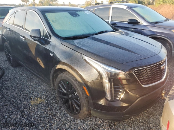 2022 Cadillac XT4 FWD Luxury with VIN 1GYAZAR40NF144779, listed as a Copart auction lot 75912804 with 9,805 mi miles and Non Repairable. Bid and sale history available at carsss.com. Image 4.
