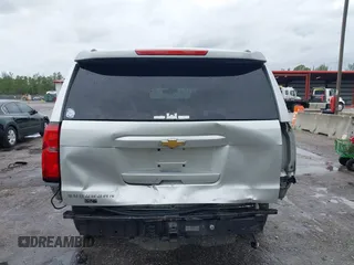 2016 Chevrolet Suburban LT z VIN 1GNSCHKCXGR111027, wystawiony jako IAAI lot #42399887 z przebiegiem 133 970 mil mil oraz . Historia ofert i sprzedaży dostępna na DreamBid. Obrazek 17.