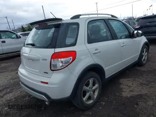 2008 Suzuki SX4 with VIN JS2YB417185102170, listed as a IAAI auction lot 42005896 with 131,810 mi miles. Bid and sale history available at carsss.com. Image 4.