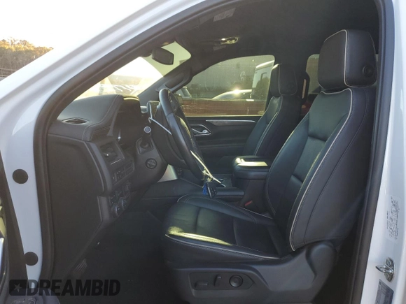 2022 Chevrolet Suburban Premier with VIN 1GNSKFKT7NR242288, listed as a Copart auction lot 79420734 with 77,006 mi miles and Salvage Title. Bid and sale history available at DreamBid. Image 7.