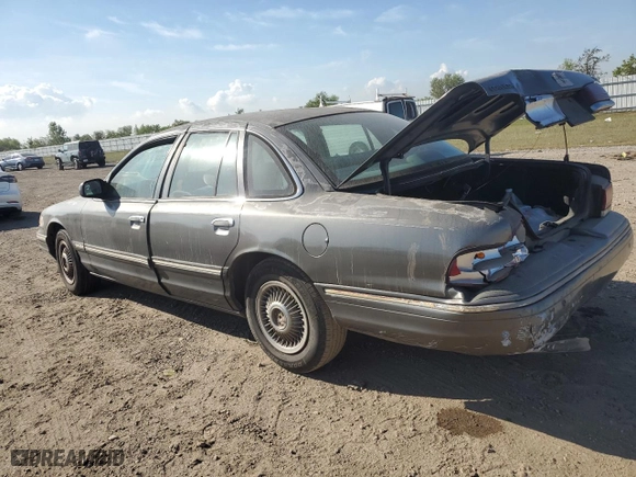 1996 Ford Crown Victoria with VIN 2FALP73WXTX196123, listed as a Copart auction lot 77444094 with 173,540 mi miles and Salvage Title. Bid and sale history available at carsss.com. Image 2.