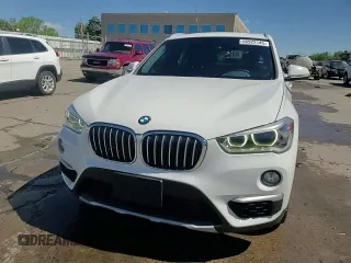2017 BMW X1 xDrive28i z VIN WBXHT3Z36H4A55751, wystawiony jako Copart lot #56922145 z przebiegiem 62 760 mil mil oraz Szkoda całkowita • Salvage title. Historia ofert i sprzedaży dostępna na DreamBid. Obrazek 15.