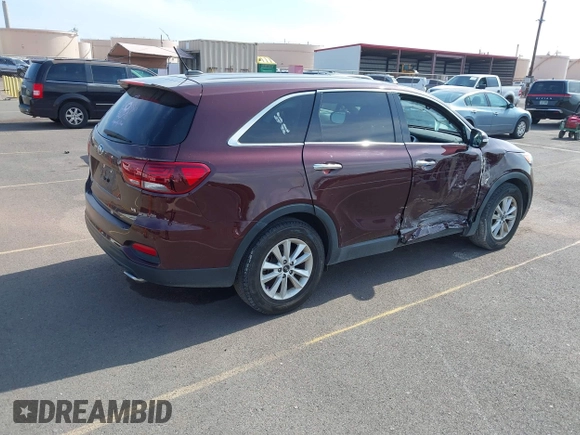 2019 Kia Sorento LX z VIN 5XYPG4A58KG565461, wystawiony jako IAAI lot #42099618 z przebiegiem 42 574 mil mil oraz . Historia ofert i sprzedaży dostępna na DreamBid. Obrazek 4.