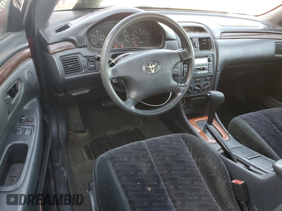 2003 Toyota Solara SE with VIN 2T1CF22P63C610142, listed as a Copart auction lot 74948484 with 195,454 mi miles and Salvage Title. Bid and sale history available at DreamBid. Image 8.