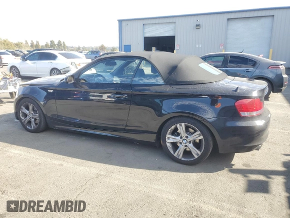 2009 BMW 1 Series 128i with VIN WBAUN13529VH81121, listed as a Copart auction lot 77849094 with 30,756 mi miles and Salvage Title. Bid and sale history available at DreamBid. Image 2.