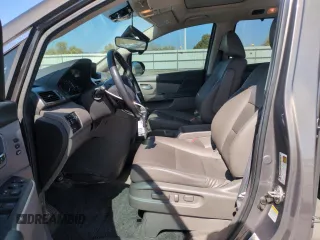 2014 Honda Odyssey Touring with VIN 5FNRL5H95EB052523, listed as a Copart auction lot 52214055 with 131,350 mi miles and Salvage Title. Bid and sale history available at DreamBid. Image 7.