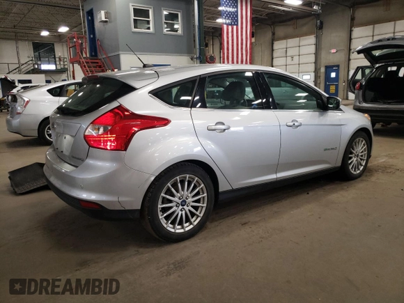 2014 Ford Focus Electric z VIN 1FADP3R4XEL330308, wystawiony jako Copart lot #54394165 z przebiegiem 82 423 mil mil oraz Tytuł czysty. Historia ofert i sprzedaży dostępna na DreamBid. Obrazek 3.
