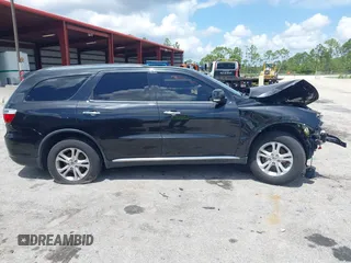 2013 Dodge Durango Crew with VIN 1C4RDHDG9DC684746, listed as a IAAI auction lot 42473302 with 122,602 mi miles and . Bid and sale history available at DreamBid. Image 14.