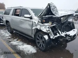 2017 Chevrolet Suburban LT z VIN 1GNSKHKC4HR167307, wystawiony jako IAAI lot #41614930 z przebiegiem 145 961 mil mil oraz . Historia ofert i sprzedaży dostępna na DreamBid. Obrazek 1.