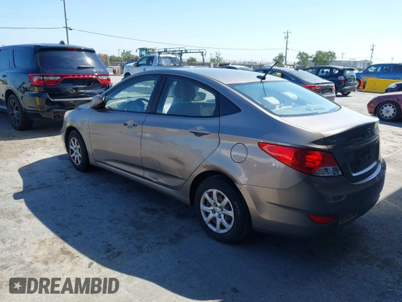 2014 Hyundai Accent GLS z VIN KMHCT4AE9EU671748, wystawiony jako IAAI lot #42356469 z przebiegiem 179 390 mil mil oraz . Historia ofert i sprzedaży dostępna na DreamBid. Obrazek 3.