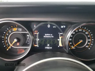 2023 Jeep Wrangler Sport S with VIN 1C4HJXDN3PW522353, listed as a Copart auction lot 86645234 with 17,562 mi miles and Salvage Title. Bid and sale history available at DreamBid. Image 9.