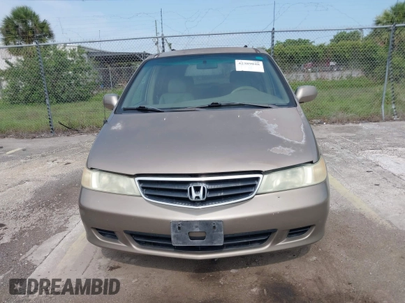 2004 Honda Odyssey EX-L z VIN 5FNRL18954B014748, wystawiony jako IAAI lot #42389048 z przebiegiem 136 176 mil mil oraz . Historia ofert i sprzedaży dostępna na DreamBid. Obrazek 6.