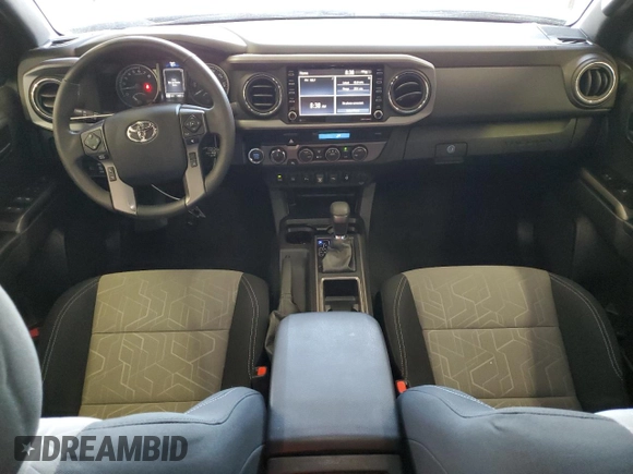 2023 Toyota Tacoma SR5 z VIN 3TMDZ5BNXPM165719, wystawiony jako Copart lot #58256035 z przebiegiem 13 681 mil mil oraz Szkoda całkowita • Salvage title. Historia ofert i sprzedaży dostępna na DreamBid. Obrazek 8.