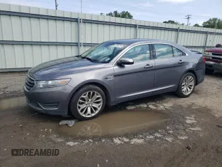 2014 Ford Taurus Limited with VIN 1FAHP2F84EG149622, listed as a Copart auction lot 63764675 with 208,801 mi miles and Salvage title. Bid and sale history available at DreamBid. Image 1.