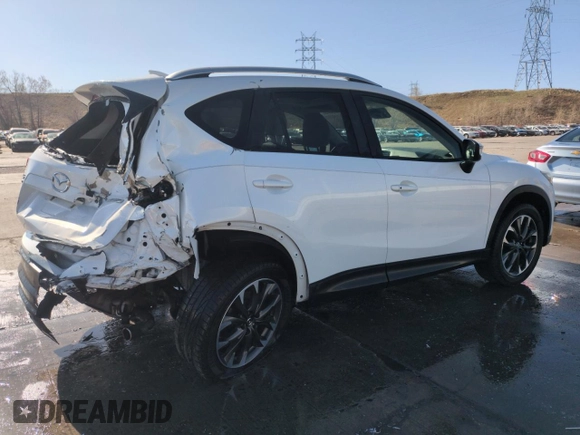 2016 Mazda CX-5 Grand Touring with VIN JM3KE4DY8G0671256, listed as a Copart auction lot 52920975 with 87,822 mi miles and Non Repairable. Bid and sale history available at carsss.com. Image 3.