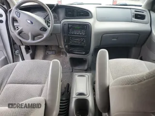 2003 Ford Windstar LX z VIN 2FMZA51433BA70321, wystawiony jako Copart lot #77114094 z przebiegiem 125 267 mil mil oraz Szkoda całkowita • Salvage title. Historia ofert i sprzedaży dostępna na DreamBid. Obrazek 8.