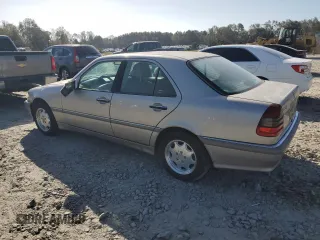 1998 Mercedes-Benz C 230/260/280/320 with VIN WDBHA23G8WA620777, listed as a Copart auction lot 77751154 with 144,032 mi miles and Salvage Title. Bid and sale history available at carsss.com. Image 2.