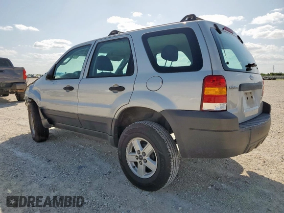 2007 Ford Escape XLS with VIN 1FMYU02Z87KB60530, listed as a Copart auction lot 61273345 with 57,574 mi miles and Salvage title. Bid and sale history available at DreamBid. Image 2.