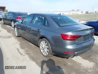 2017 Audi A4 Premium z VIN WAUANAF47HN017928, wystawiony jako IAAI lot #41753286 z przebiegiem 103 447 mil mil oraz . Historia ofert i sprzedaży dostępna na DreamBid. Obrazek 3.