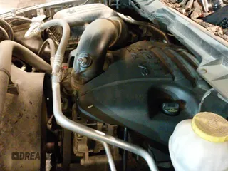 2019 Ram 1500 Tradesman z VIN 1C6RR7KT4KS548594, wystawiony jako IAAI lot #41079670 z przebiegiem 96 212 mil mil oraz . Historia ofert i sprzedaży dostępna na DreamBid. Obrazek 21.