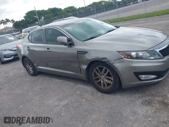 2013 Kia Optima LX z VIN 5XXGM4A74DG147688, wystawiony jako IAAI lot #42127503 z przebiegiem 148 705 mil mil oraz . Historia ofert i sprzedaży dostępna na DreamBid. Obrazek 6.